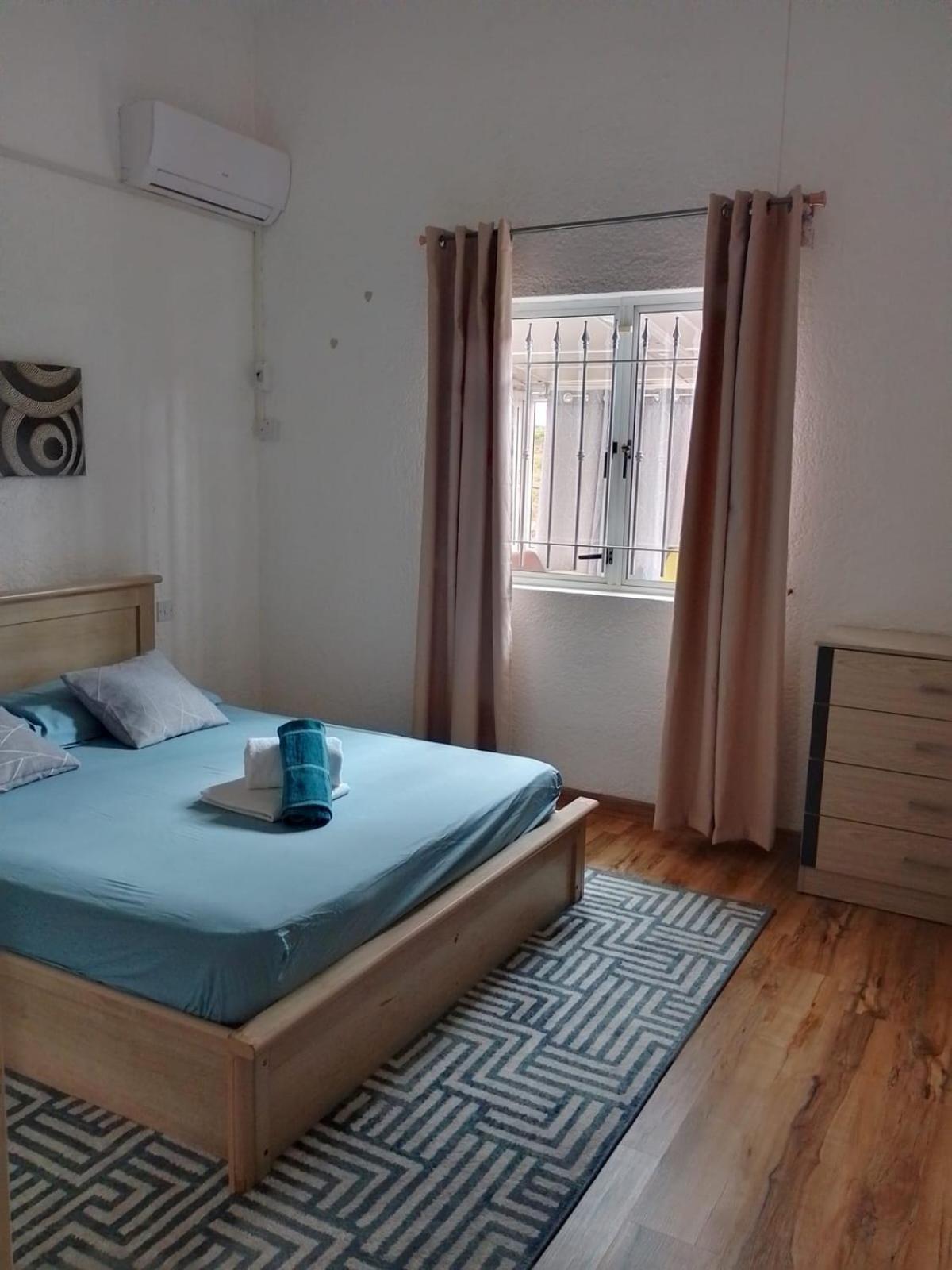 Ji Penthouse Apartment Flic en Flac Luaran gambar